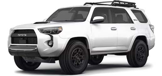 A picture from a driver's side angel, showing the side and front of a white 2023 Toyota 4Runner TRD Pro.